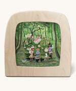 Toverlux Magic Lamp silhouette by artist Gwen van Knippenberg. A watercolour and pencil style illustration of fairy children having a tea party in a green forest.