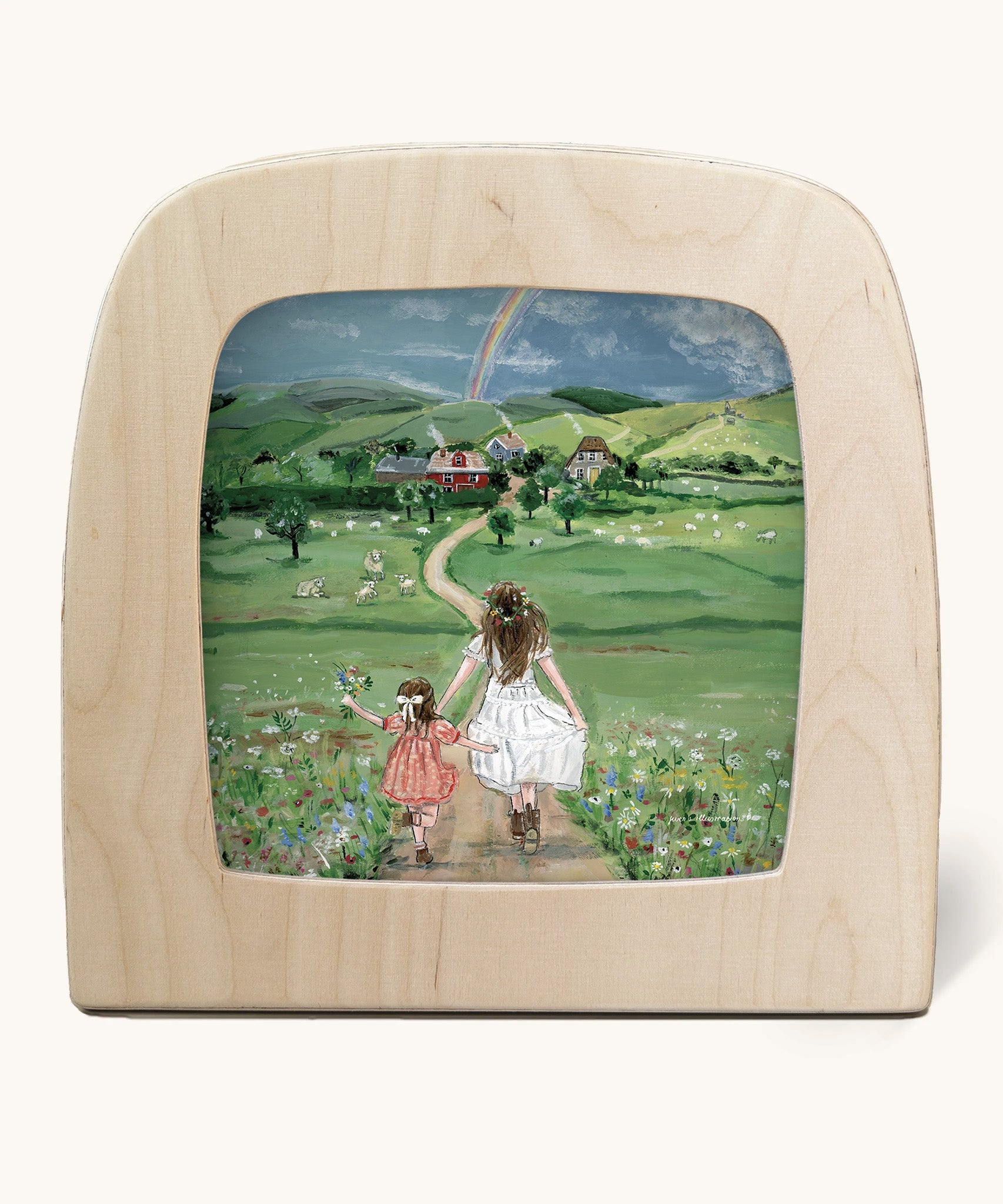 Toverlux Magic Lamp silhouette by artist Gwen van Knippenberg. A watercolour and pencil style illustration of one older and one younger girl skipping down a rural track towards a village that has a rainbow in the background.