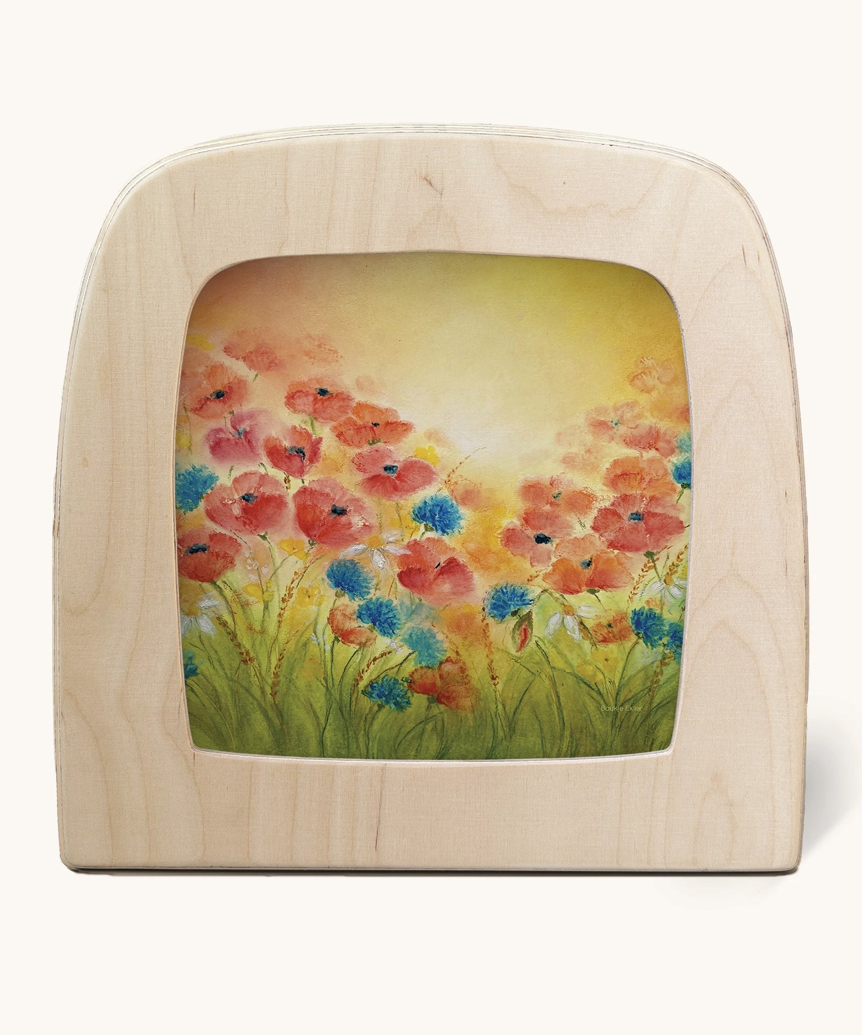 A Toverlux silhouette in the magic lamp, the illustration is of some poppies in a field with a dreamy golden yellow sky in the background.