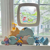 Toverlux Edulux watercycles silhouette featuring Stephanie Green's Mountain artwork shown in a wooden magic window frame. A Grimm's weather set has been set up on the windowsill underneath.
This silhouette is part of a wide range of Toverlux silhouettes available here at Babipur. 