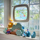 Toverlux Edulux watercycles silhouette featuring Stephanie Green's River artwork shown in a wooden magic window frame. A Grimm's weather set has been set up on the windowsill underneath.
This silhouette is part of a wide range of Toverlux silhouettes available here at Babipur. 
