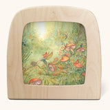 Toverlux Magic Lamp silhouette by Anne illustrates, pixie forest artwork of pixies and fairies in a magical forest schence with snails among mushrooms, ferns and foliage.
