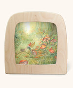 Toverlux Magic Lamp silhouette by Anne illustrates, pixie forest artwork of pixies and fairies in a magical forest schence with snails among mushrooms, ferns and foliage.