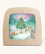 Toverlux Magic Lamp silhouette by Anne illustrates, yuletree grove artwork of a Christmas tree surrounded by forest animals and gnomes surrounded by festive foliage and snow topped toadstools.