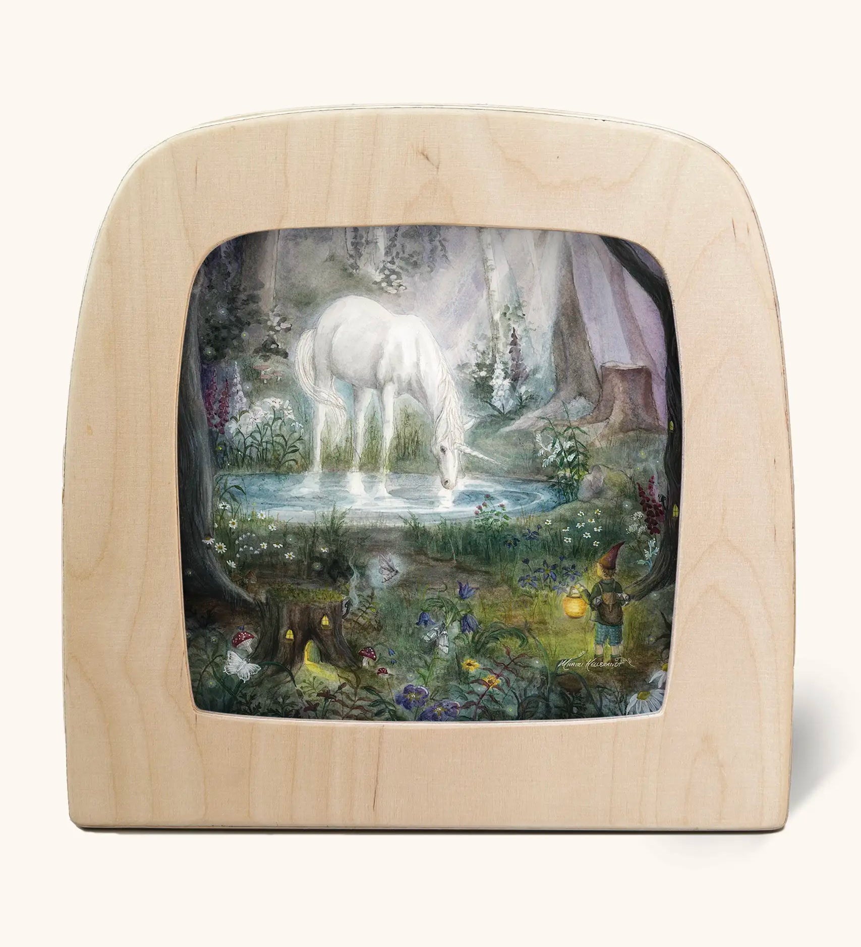 Toverlux silhouette artwork of a white unicorn drinking from a lake in a magical woodland scene with pixies, fairies, and toadstools.