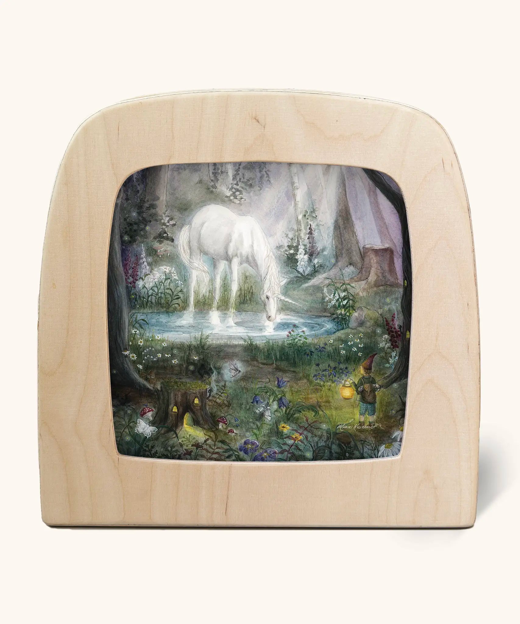 Toverlux silhouette artwork of a white unicorn drinking from a lake in a magical woodland scene with pixies, fairies, and toadstools.
