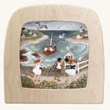 Toverlux magic lamp silhouette with seaside artwork by Tijana Draws.