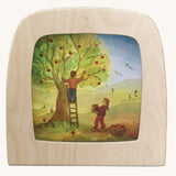 Toverlux magic lamp silhouette featuring apple tree artwork by Vogel Geluk. 