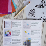 Detailed step by step instruction booklet included with the Toverlux Summer butterflies DIY silhouette transparency craft kit featuring a Vogel Geluk design. 
