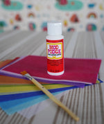 Mod podge glue sealer, paintbrush and coloured papers included with the Toverlux Summer butterflies DIY silhouette transparency craft kit featuring a Vogel Geluk design. 