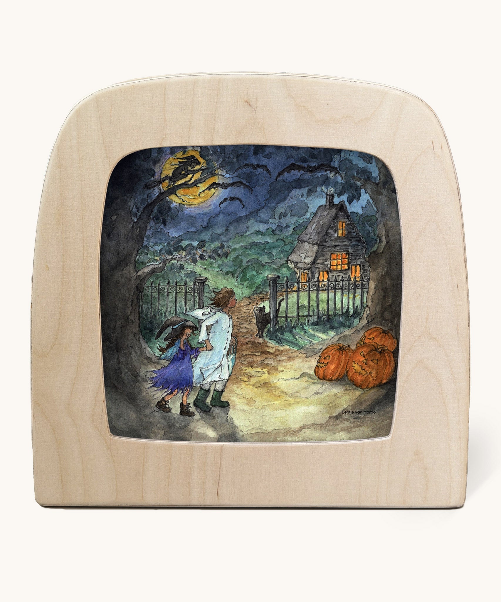 Toverlux Magic Lamp Silhouette - with a trick or treat Artwork By Eentje Van Margo. A moonlit spooky scene showing 2 children next to a house with pumpkins, a cat and bats flying outside. 