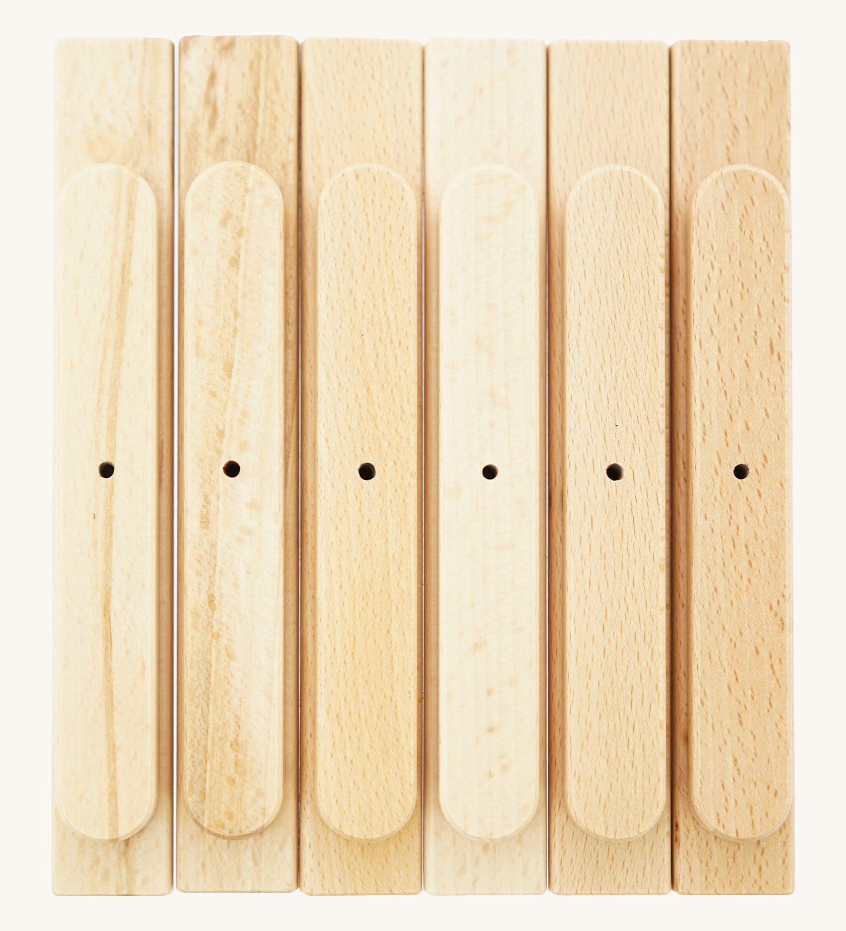 Bottom view of the Triclimb wooden natural Miri sticks showing the extended base where the stick can slot on top of the Triclimb Miri slide