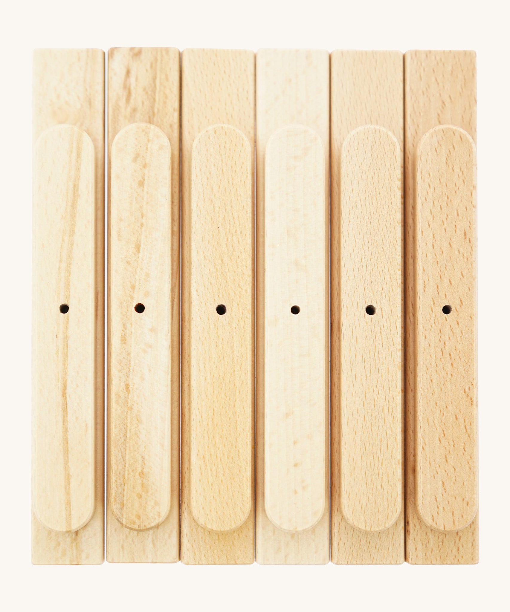 Bottom view of the Triclimb wooden natural Miri sticks showing the extended base where the stick can slot on top of the Triclimb Miri slide