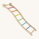 Triclimb wooden wibli ladder with pastel inspired coloured rungs including pink, orange, yellow, green, blue and purple. Features Triclimb joints on one end of the ladder to hook onto a Triclimb wooden pikler climbing frame