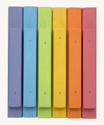 Bottom view of the Triclimb wooden pastel Miri sticks showing the extended base where the stick can slot on top of the Triclimb Miri slide