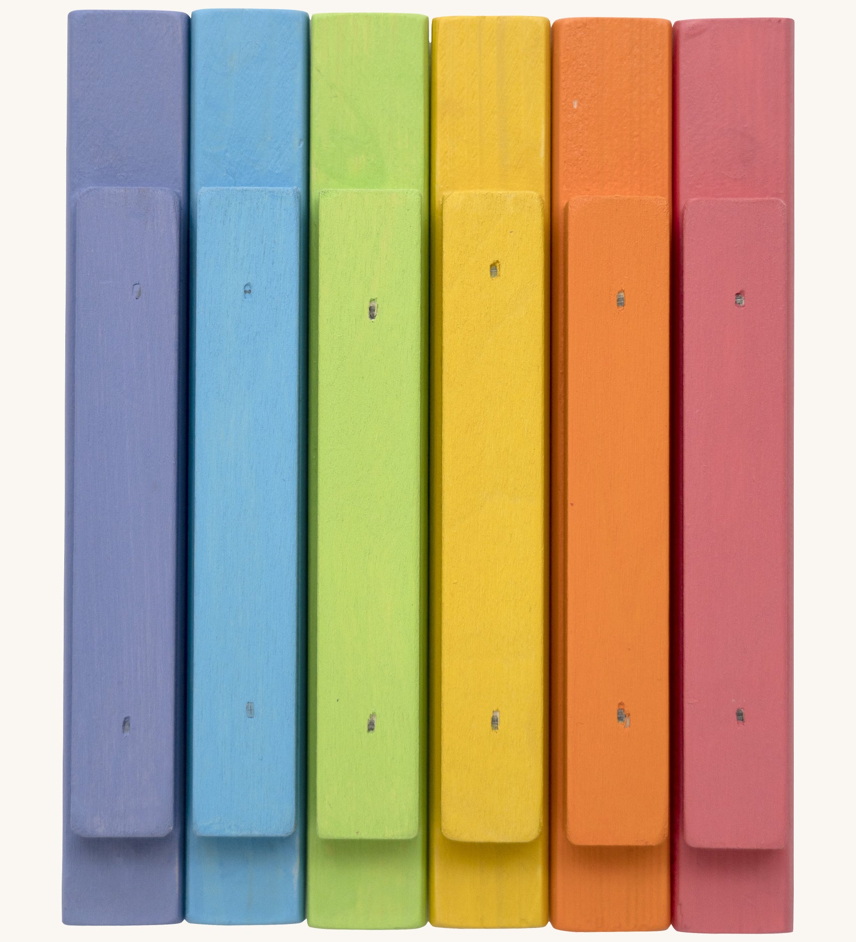 Bottom view of the Triclimb wooden pastel Miri sticks showing the extended base where the stick can slot on top of the Triclimb Miri slide