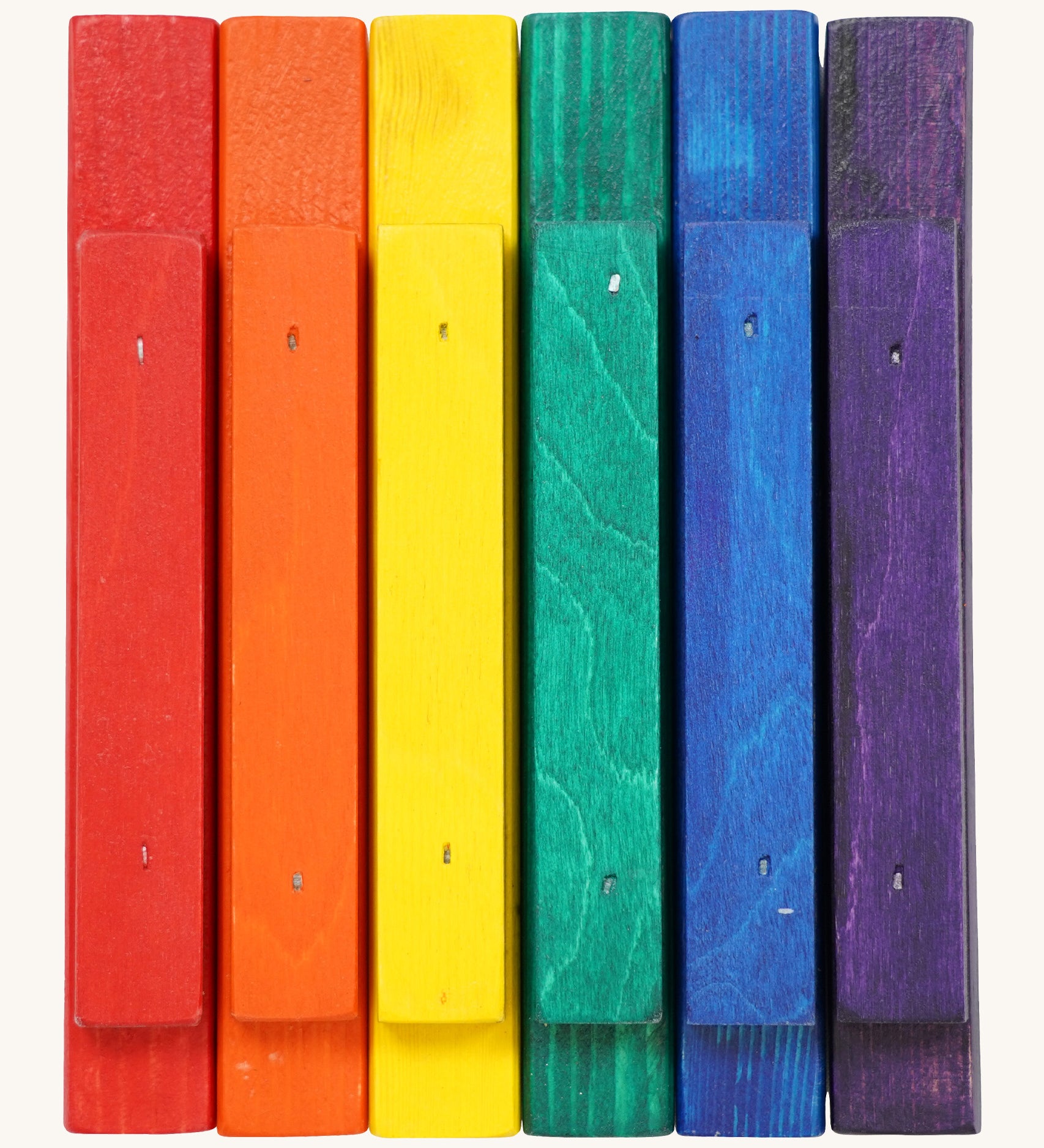 Bottom view of the Triclimb wooden rainbow Miri sticks showing the extended base where the stick can slot on top of the Triclimb Miri slide