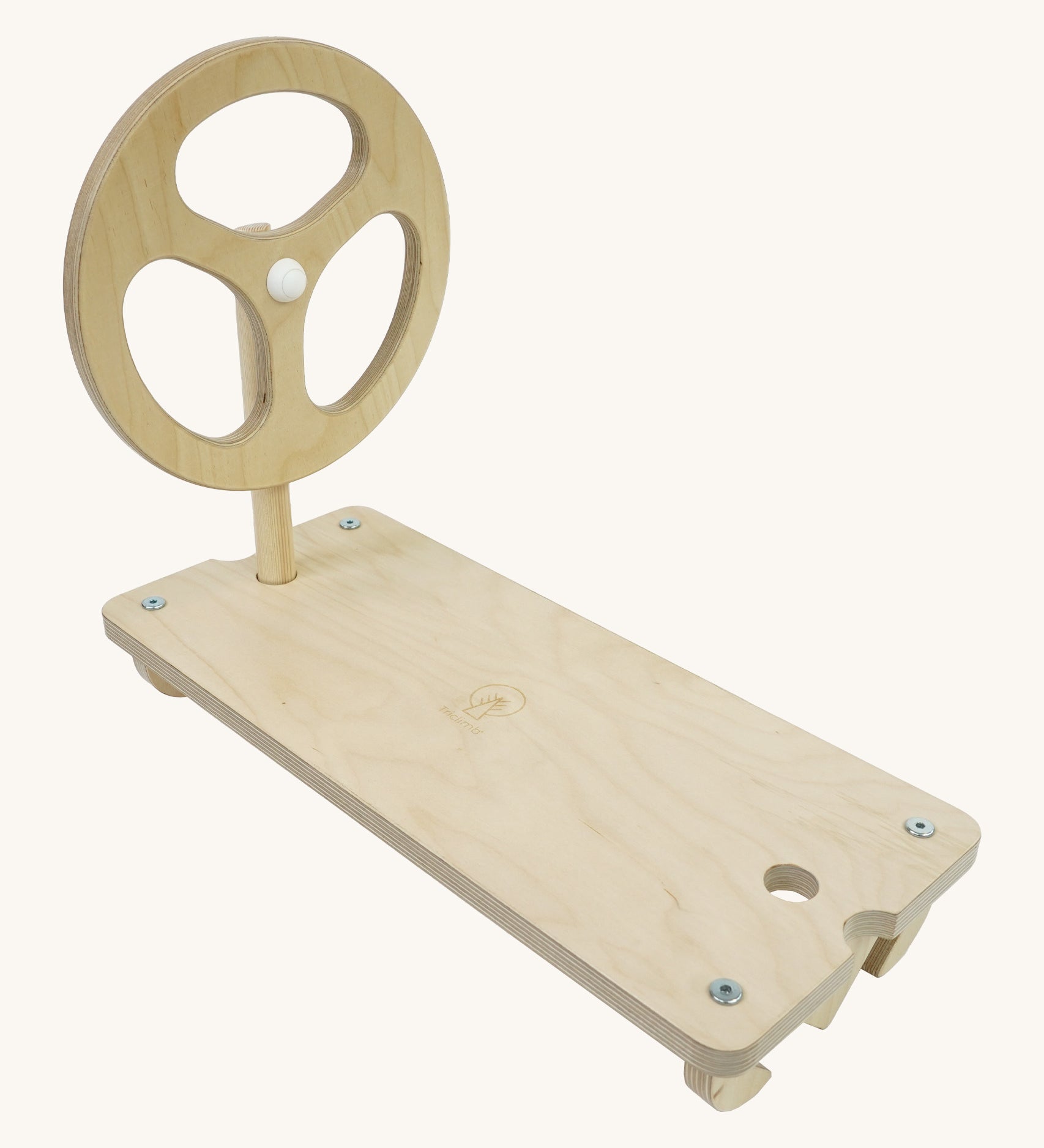 A Triclimb wooden Arben wheel attatched onto a Arben base that can be hooked on the top rungs of a Triclimb pikler climbing frame