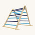 Triclimb folding wooden pikler climbing frame with light and dark blue rungs. Features a natural coloured rungs on the bottom as a base. 