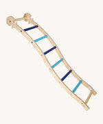 Triclimb wooden wibli ladder in blue features light and dark blue rungs with a Triclimb joint on one end of the ladder to hook onto a Triclimb wooden pikler climbing frame