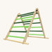 Triclimb folding wooden pikler climbing frame with light and dark green rungs. Features a natural coloured rungs on the bottom as a base. 