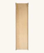 Triclimb wooden Miri slide showing the side that can be used as a slide or as a ramp. Features a joint on one end to hook onto a Triclimb pikler climbing frame