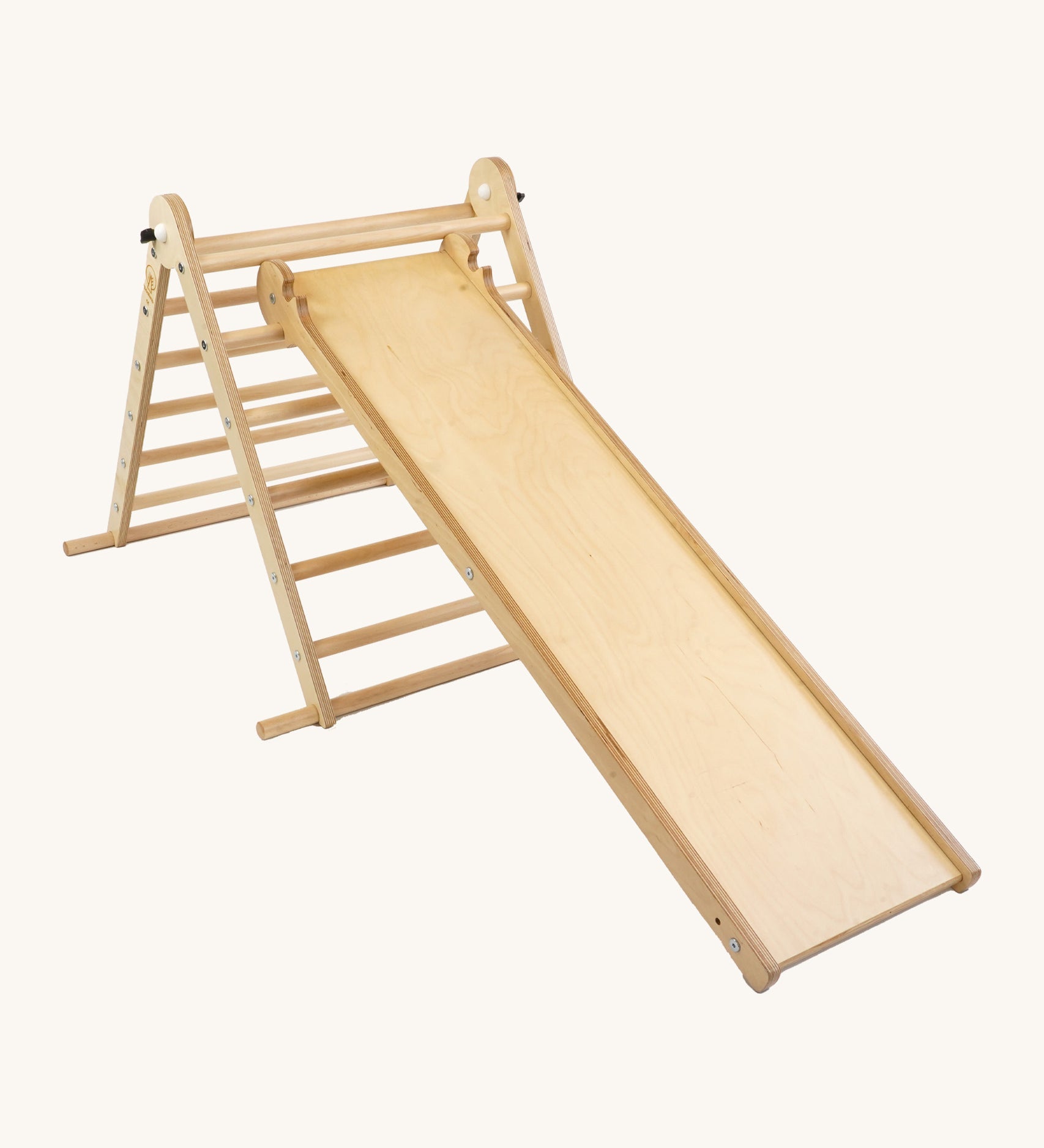 Triclimb wooden folding pikler climbing frame with natural unpainted rungs showing the second side Triclimb Miri slide hooked on a rung.