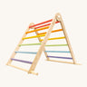 Triclimb folding wooden pikler climbing frame with pastel inspired coloured rungs including purple, blue, green, yellow, orange and pink. Features longer natural coloured rungs on the bottom as a base. 