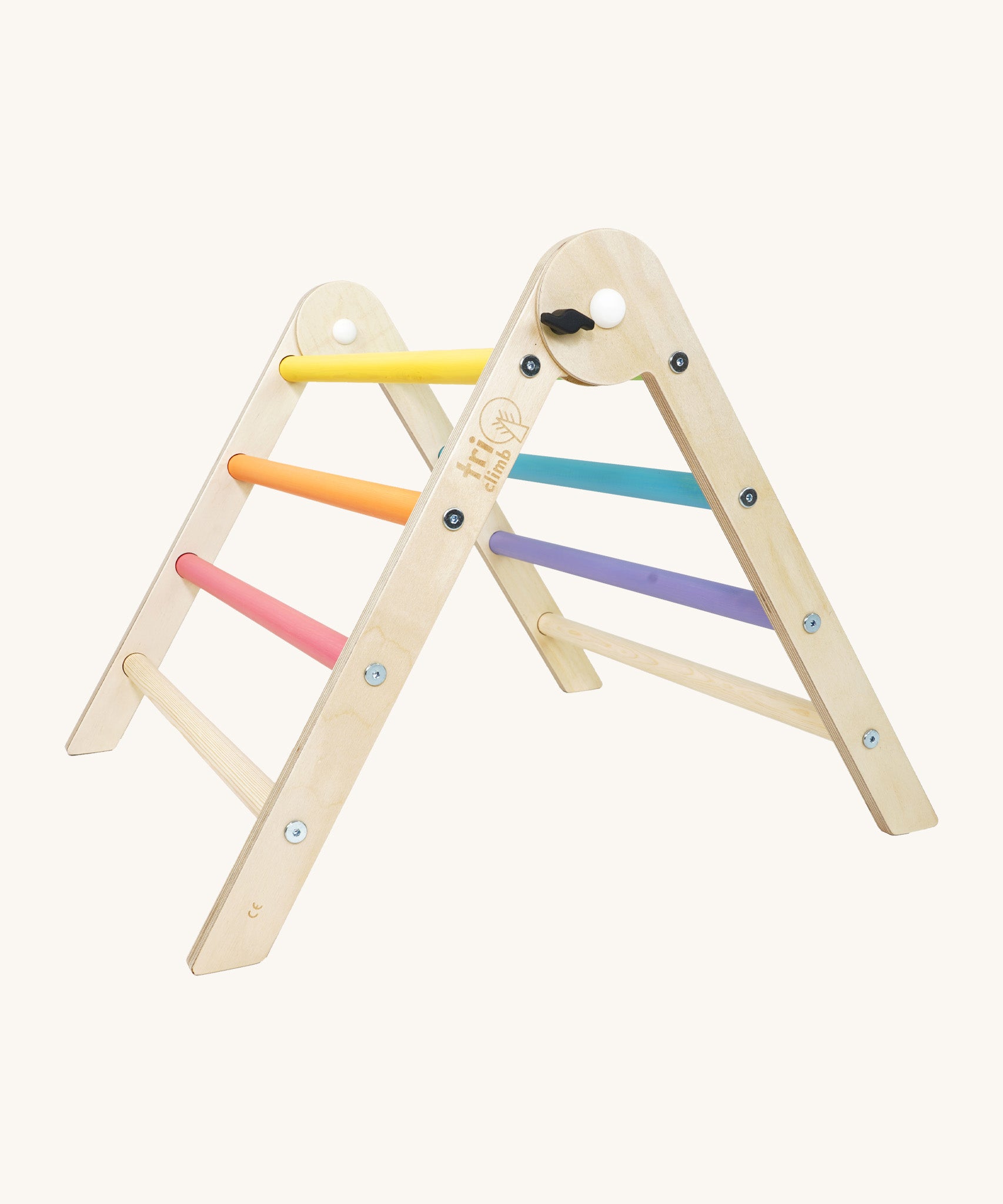 Triclimb wooden pastel pwt folding pikler climbing frame. A smaller version of the full size Triclimb pikler climbing frame with pastel themed coloured rungs including pink, orange, yellow, purple, blue and green.