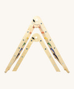Triclimb wooden pwt folding pikler climbing frame underneath the full size Triclimb pikler climbing frame showing the size comparison