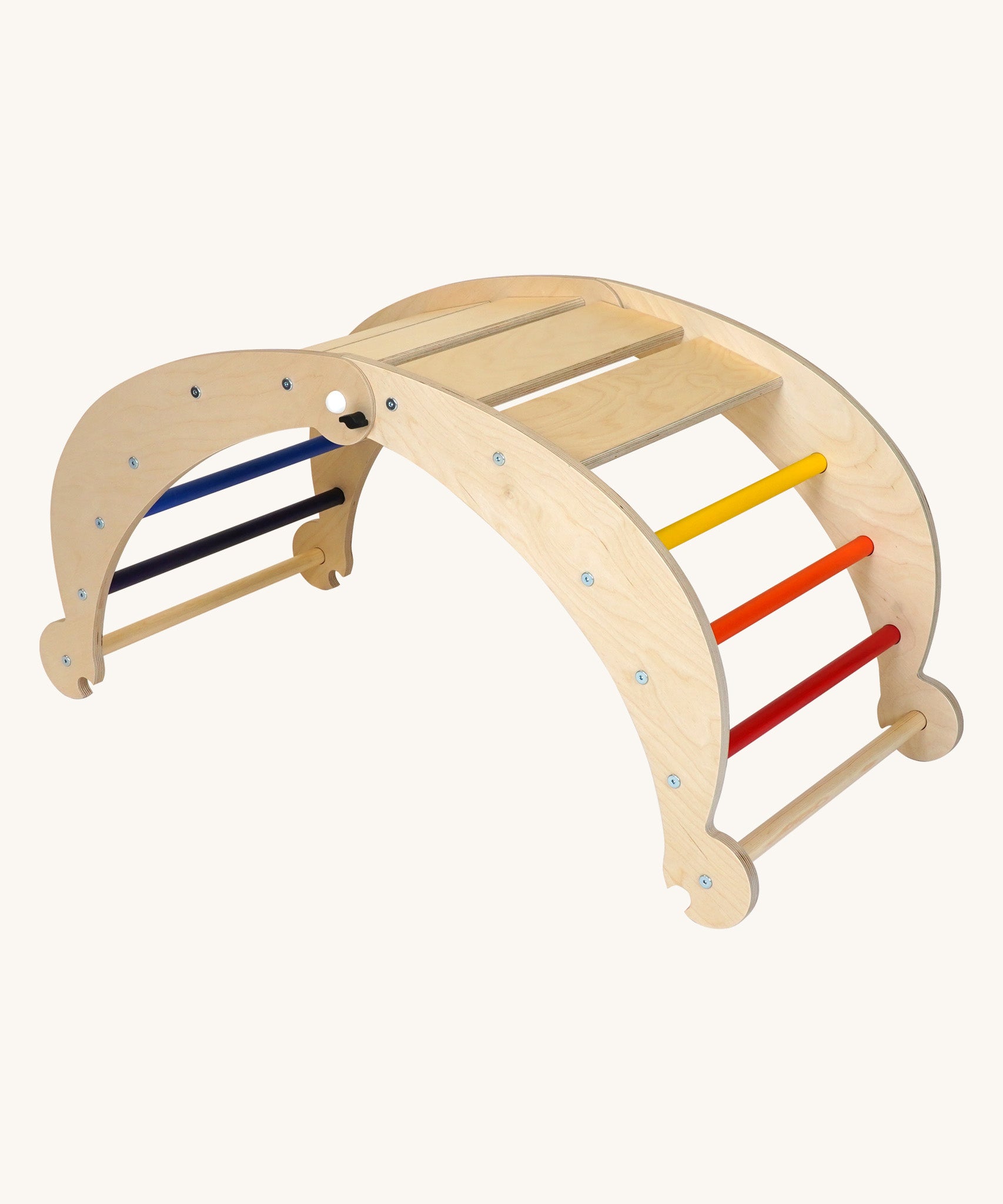 Triclimb wooden folding rocker Archi frame with rainbow coloured rungs including red, orange, yellow, purple blue and green. Features wide wooden slats on top for sitting and attachments on each end to hook onto a Triclimb pikler climbing frame