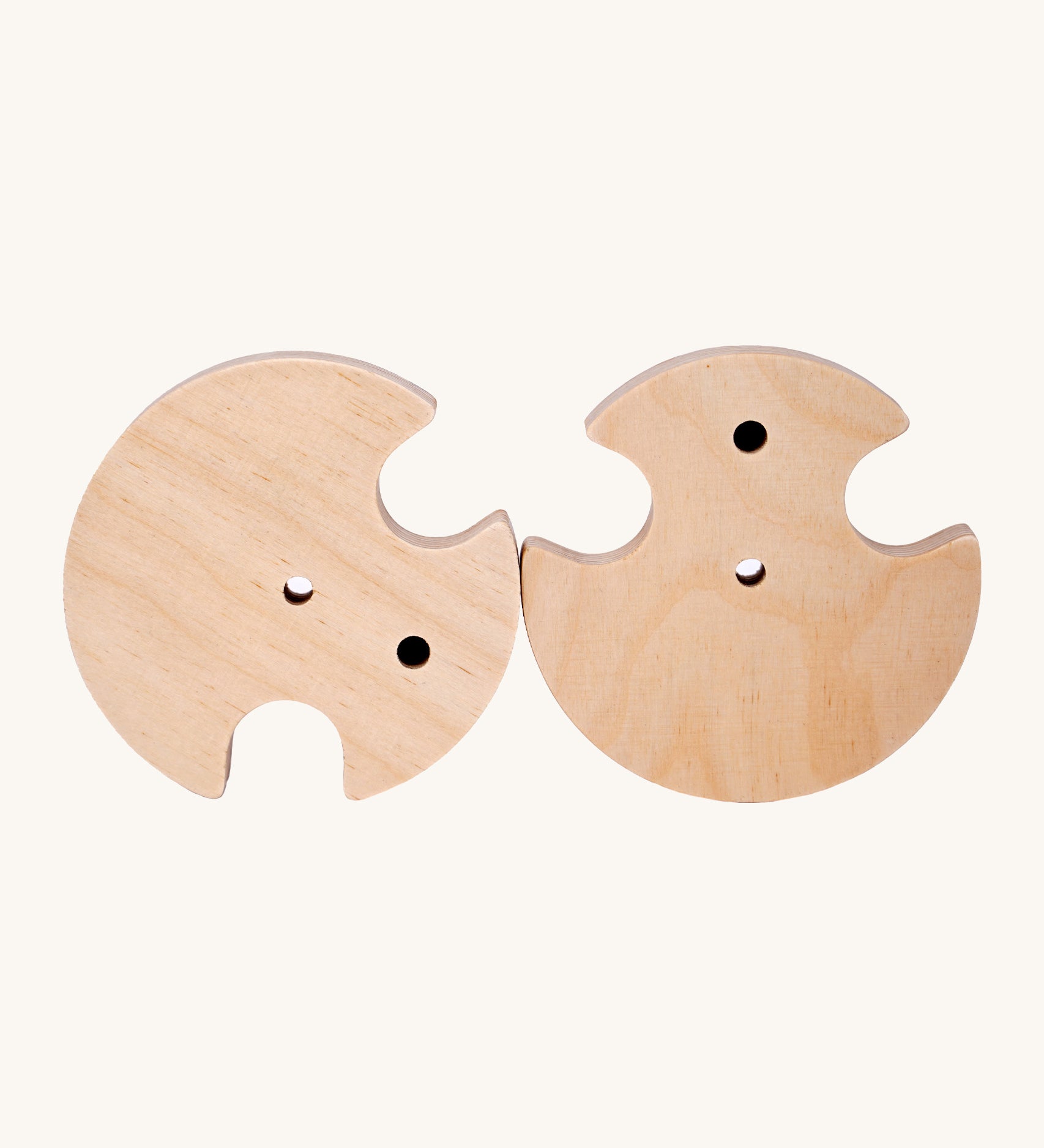 A pair of wooden Triclimb trifix joints that can be attached to the bottom of a Miri Slide or other suitable accessories for a secured connections