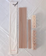 Wooden poles, corner blocks and cotton bag from the Trigonos big start set