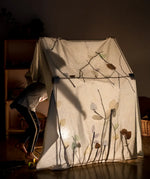A cosy tent build made from the trigonos kernel organic construction set 