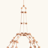 A tower made from various wooden poles and blocks out of the Trigonos mini large construction set 