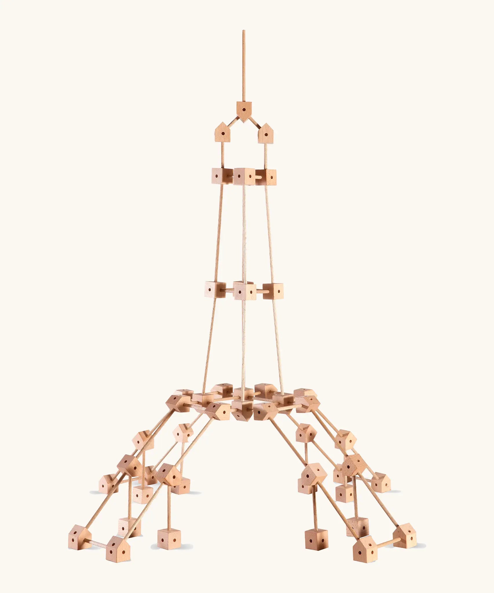 A tower made from various wooden poles and blocks out of the Trigonos mini large construction set 