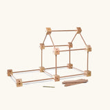 A simple structure using the Trigonos starter set pieces showing different wooden poles and corner pieces