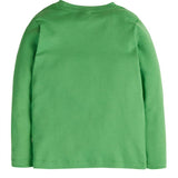 a green organic cotton long-sleeved children’s top with a colourful yellow snake applique in the shape of the number 7.