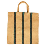 Turtle Bags Blue and Black Stripey Bag. A natural jute bag with short handles and 3 vertical blue and black stripes. laid flat on white background