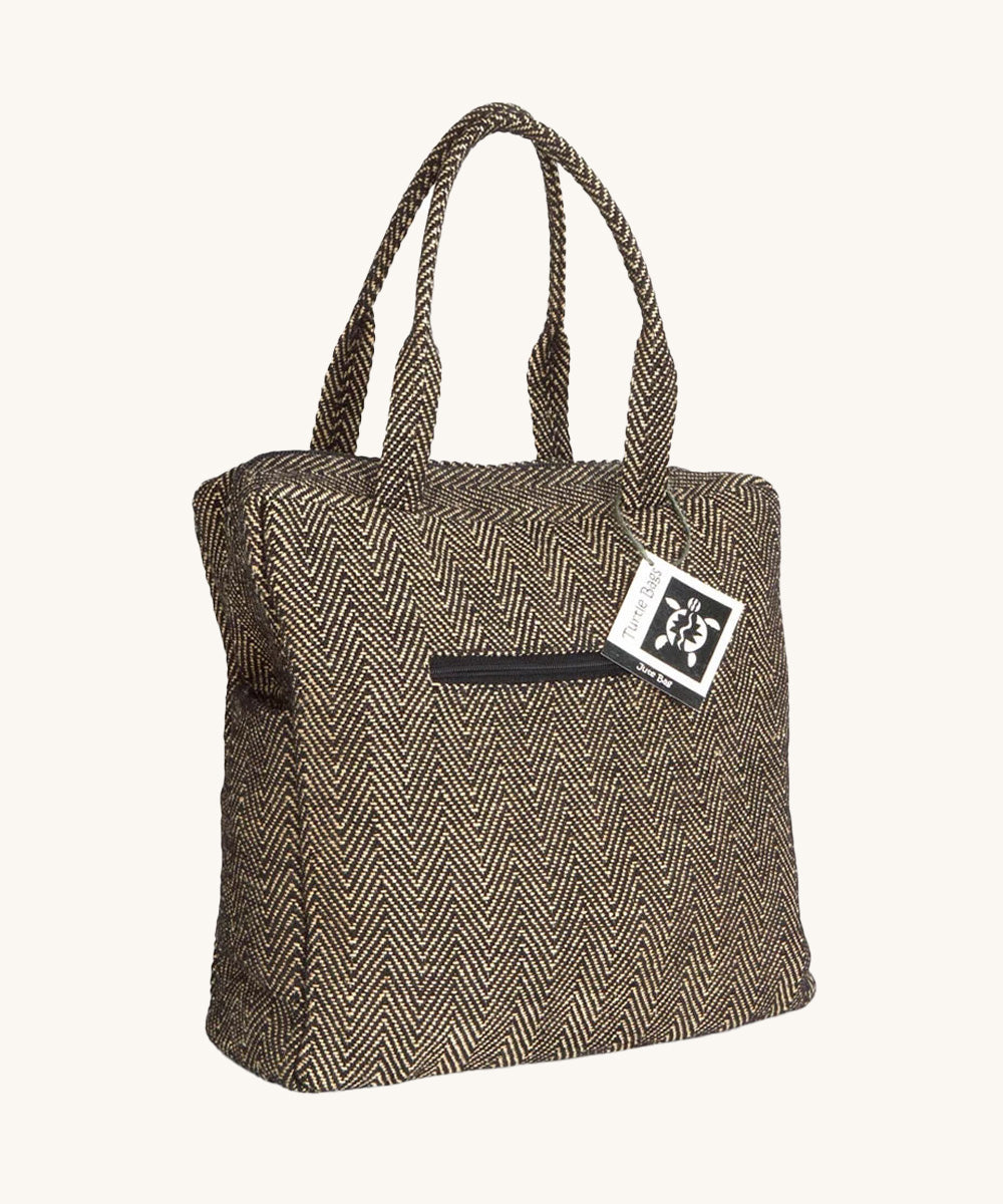 The Turtle Bags jute laptop duffle bag, in a black woven design with zig zags