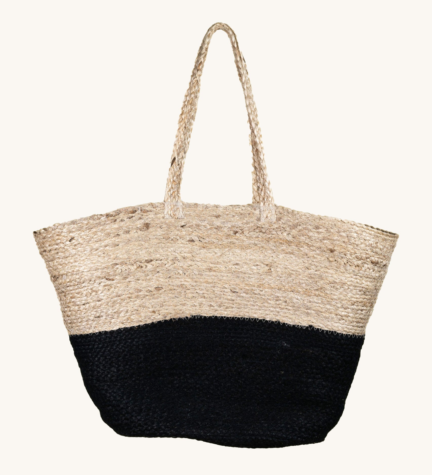 The Turtle Bags hand woven and fair trade jute basket bag with handles, and a black colour block design