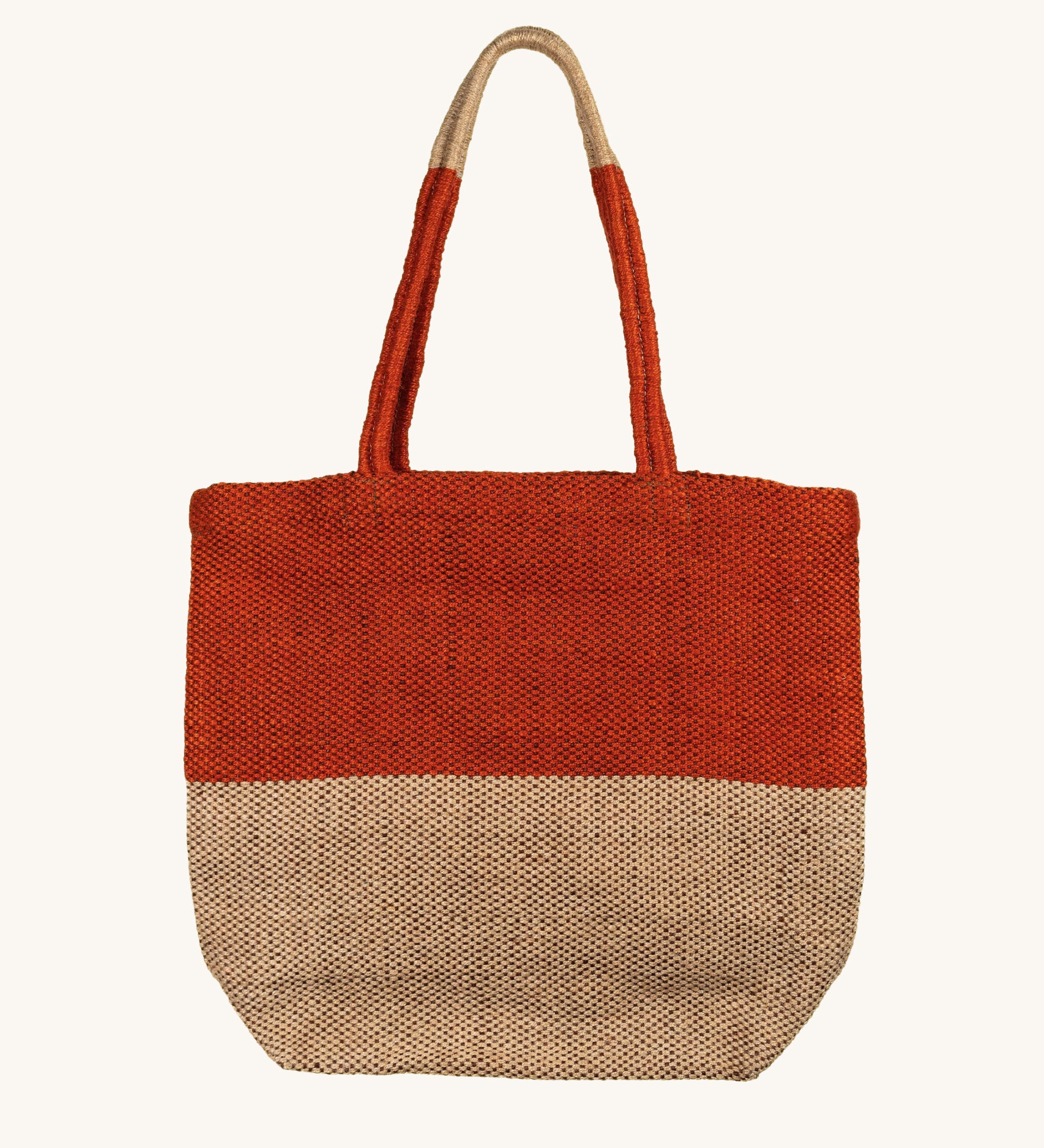 The Turtle Bags hand woven fair trade jute tote bag, in an orange paprika colour block design