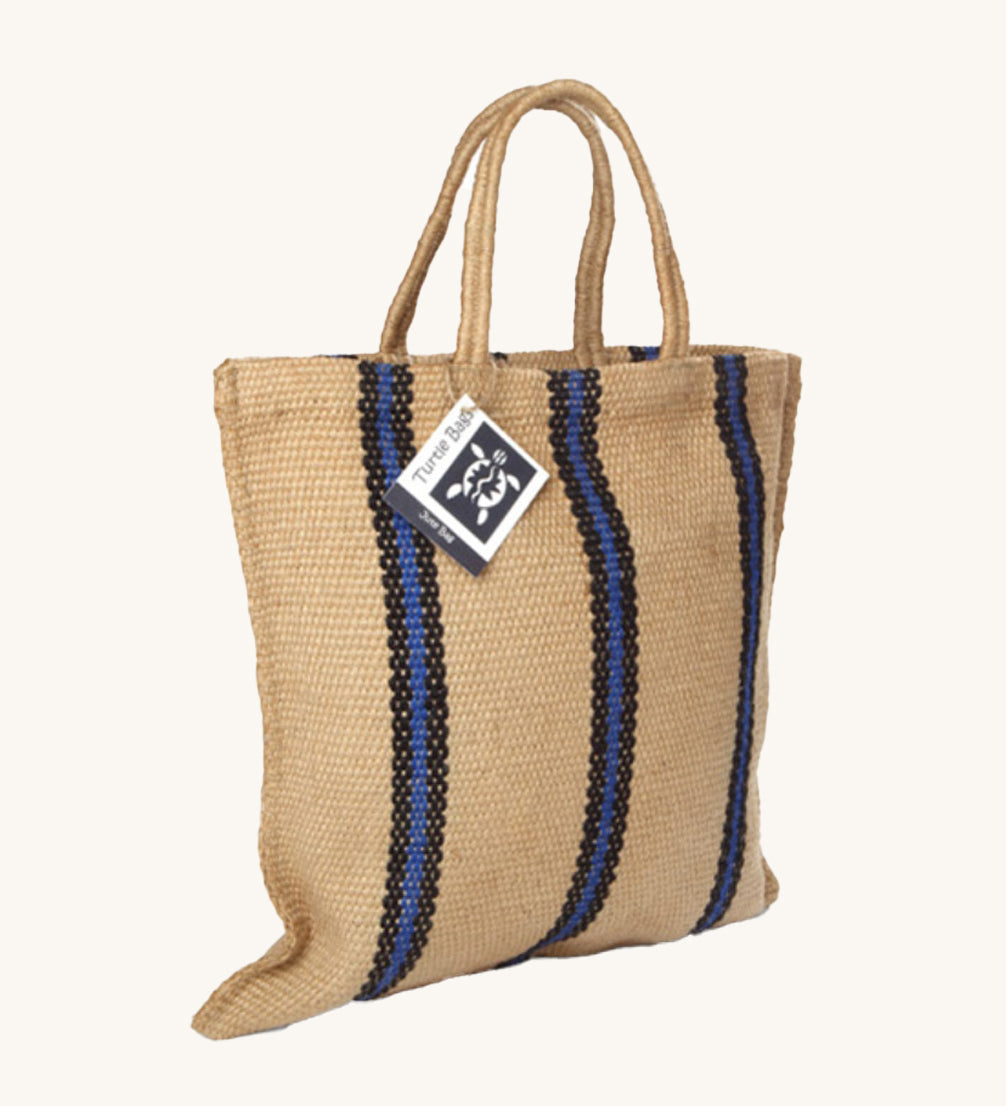 The Turtle Bags hand woven jute tote bag in a blue and black stripe design