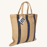 The Turtle Bags hand woven jute tote bag in a blue and black stripe design