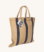 The Turtle Bags hand woven jute tote bag in a blue and black stripe design