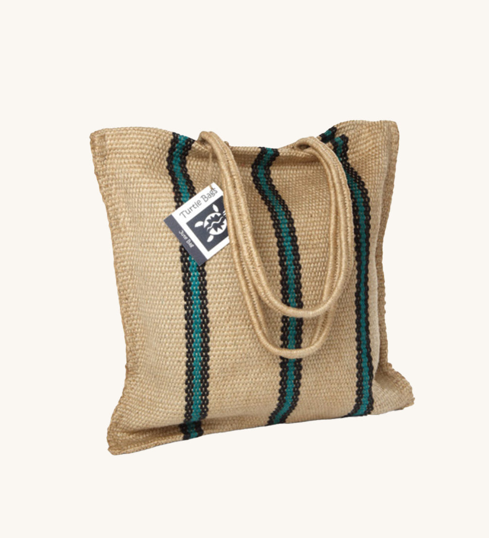 The Turtle Bags hand woven stripey jute tote shopping bag in a green stripe design with a long handle