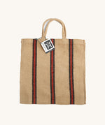 The Turtle Bags hand woven jute tote bag in a red and black stripe design
