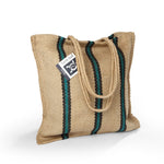 Turtle Bags Long Handled Green and Black Stripey Bag. A natural jute bag with long handles and 3 vertical green and black stripes. Stood upright with white background