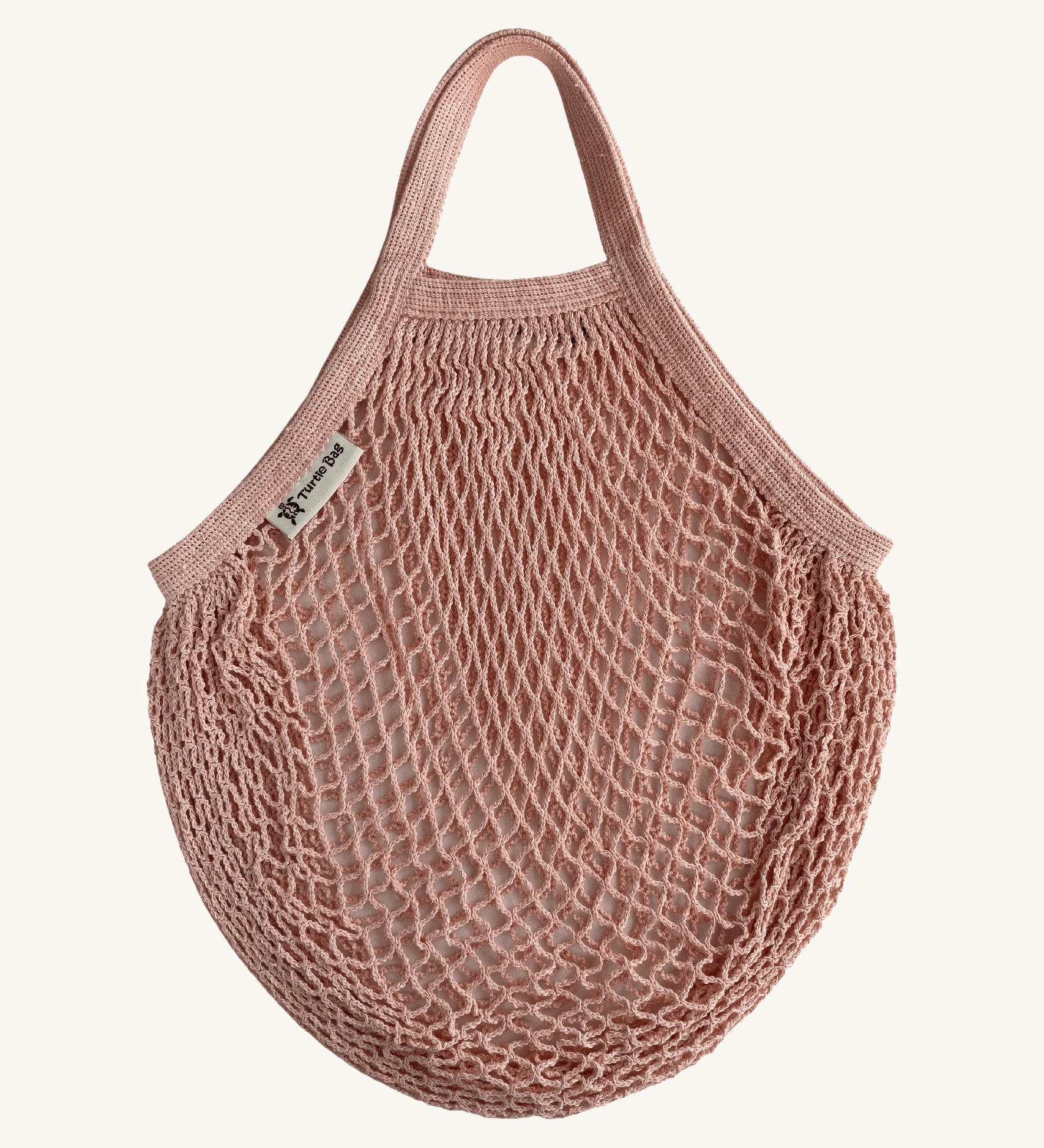 The Turtle Bags organic, fair trade cotton string grocery shopping reusable bag in blush pink