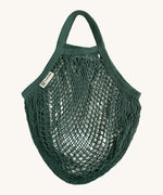 The Turtle Bags organic, fair trade cotton string grocery shopping reusable bag in bottle green
